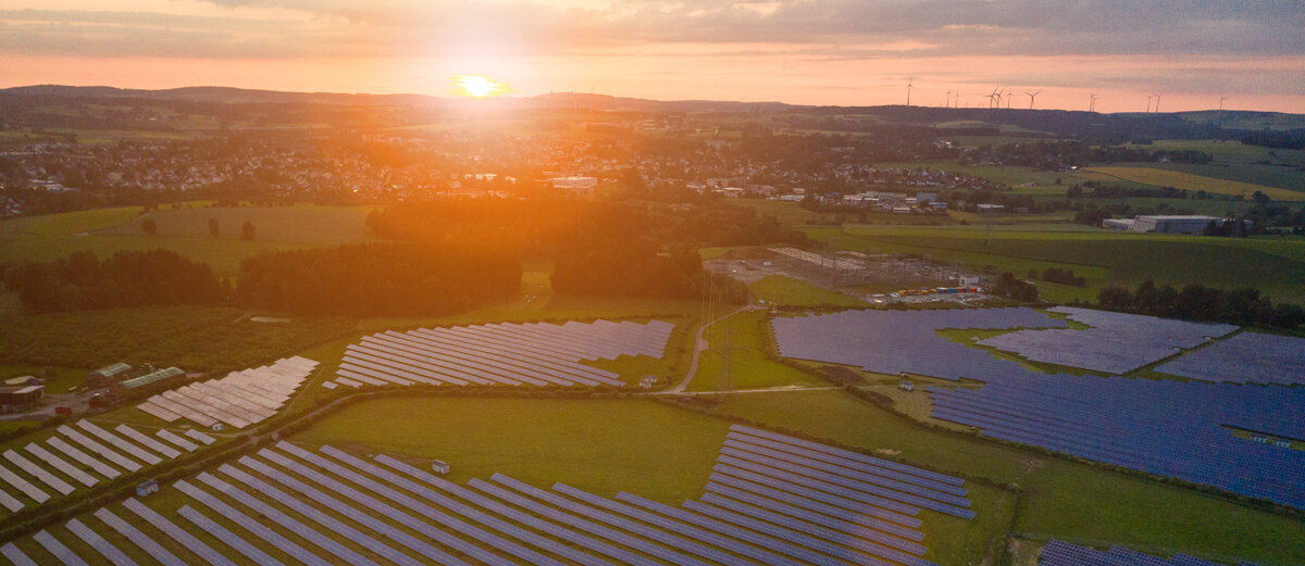 Solar park sunset Iqony Solar Energy Solutions